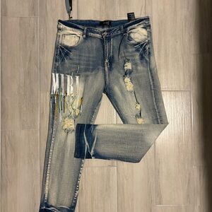 AMIRI Blue Distressed Skinny Jeans